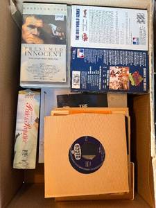 lot 456 image: Beatles Anthology & Presumed Innocent VHS & 1991 World Series Memorabilia Box & Decca 7in Vinyl Assortment