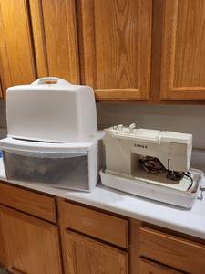 lot 229 image: Singer Sewing Machine with Case, Thread, Notions, and Accessories Lot