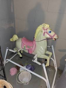 lot 252 image: Vintage Ride-On Spring Rocking Horse Toy with Pink Saddle