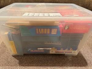 lot 329 image: Large Collection of Board Games including Taboo, Scattergories, Monopoly Deluxe, Pictionary & Guess Who Vintage Board Games