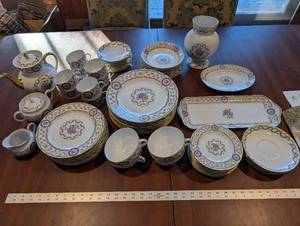 lot 1 image: HAVILAND Limoges Floral Dinnerware Set - 8 Place Settings With Teapot, Sugar Bowl, and Serving Plates