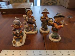 lot 125 image: Goebel W. Germany 4-Piece Children Figurine Set with Animals