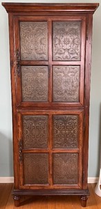 lot 28 image: Antique-Style Wooden Cabinet - 4 Panel Doors with Decorative Embossed Inserts