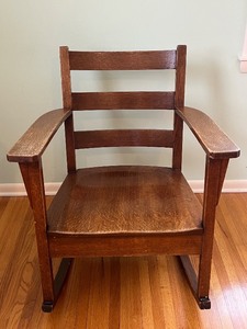 lot 40 image: Mission-Style Oak Rocking Chair with Slat Back and Armrests