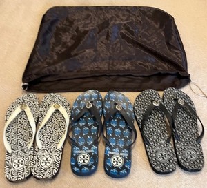 lot 41 image: Tory Burch Flip Flops - 4 Pairs (Lot of 4)
