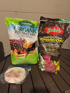 lot 67 image: Espoma Organic Potting Mix & Hoffman Charcoal Round Lid Kit with Screws (Lot of 3)