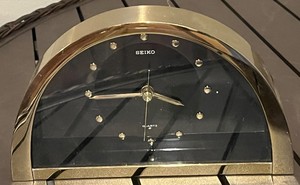 lot 68 image: Seiko Arc-Top Mantel Clock - Quartz Movement, Black Dial, Gold Finish