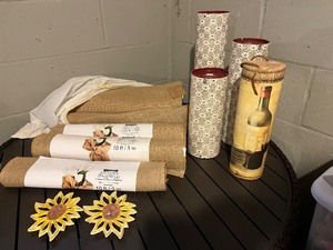 lot 85 image: fabric Rolls - 4 Burlap (10 ft  3 m) & 3 empty Patterned Tubes, Sunflower Trivets, Wine gift box