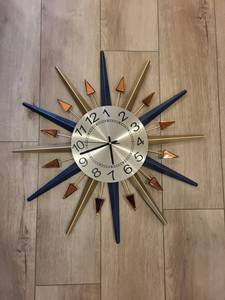 Starburst Wall Clock - Navy & Gold Spokes with Amber Accents, 12-Hour Dial