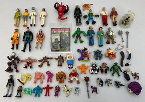 lot 41 image: Misc. Miniature Action Figures And More