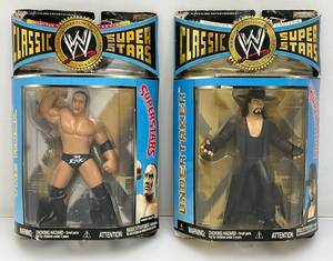 lot 55 image: Vintage Collectible Wrestling  Classic Super Stars Including The ROCK And The UNDERTAKER (NEW OLD STOCK)