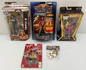 lot 56 image: Misc. Wrestling Figures Including Triple H And More (NIB)
