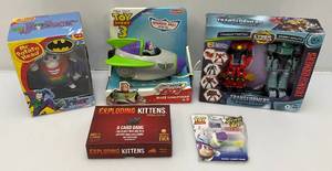 lot 80 image: Misc. NEW Collectible Toys Including Joker Mr. Potato Head, Transformers And More (NIB)