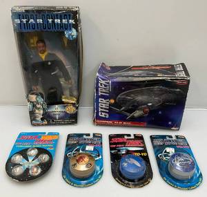 lot 104 image: Misc. STAR TREK Action Figures (New On Cards)