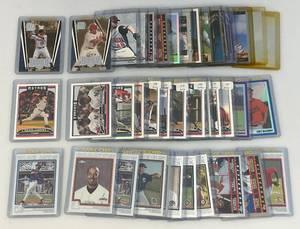 lot 189 image: Misc. Unsorted Sports Cards All In Top Loaders