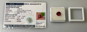 lot 213 image: AGSL Authentic Gem Security Laboratory Natural PAINITE 3.20 CT Excellent Pear (Red) In Protective Case