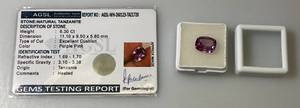lot 215 image: AGSL Authentic Gem Security Laboratory Natural TANZANITE 6.30 CT Excellent Chusion (Purple-Pink) In Protective Case