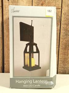 lot 182 image: Hanging Lantern with LED Candle Black Metal Indoor Outdoor Wall Decor
