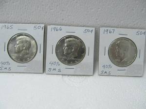 lot 44 image: 3 Silver Kennedy Half Dollars
