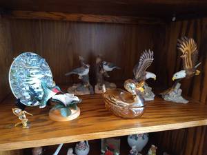 lot 32 image: Middle Shelf of Bird Figurines, Bookends, Candy Dish and Suncatcher