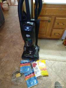 lot 93 image: Dirt Devil Vaccuum With Supplies - Belts and Bags