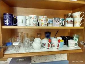 lot 97 image: 2 Shelves of Mugs and Glassware