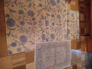 lot 188 image: Lot of (4) Soft Yellow, Blue, and Cream Rugs