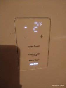 lot 239 image: GE Upright Freezer