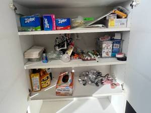 lot 119 image: Office Supply and First Aid Lot with Ziploc Bags, Legal Pads, Markers, Bandages, and More - quantities unverified