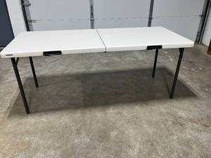 lot 70 image: Lifetime Fold-In-Half Portable Plastic Table