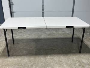lot 72 image: Lifetime 6-Foot Folding Table with Carry Handle