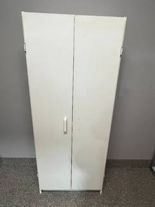 lot 90 image: Tall White Storage Cabinet with Assorted Household Supplies