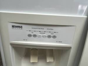 Kenmore Elite Side-by-Side Refrigerator with Ice and Water Dispenser - contents not included