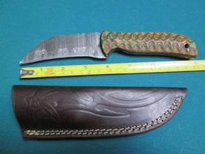 lot 513 image: Hand crafted knife with a leather s...