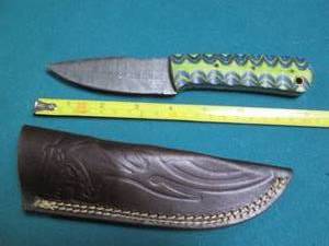 lot 600 image: Hand crafted Damascus knife with le...