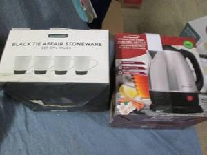 lot 51 image: Set of 4 mugs and a coffee maker...