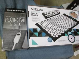 lot 54 image: Heating pad and acupressure mat and...