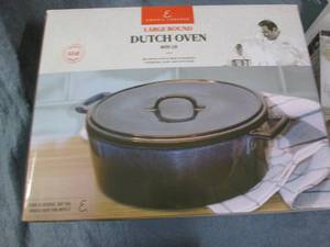 lot 57 image: New large round Dutch oven with lid...