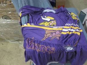 lot 65 image: Vikings dress...