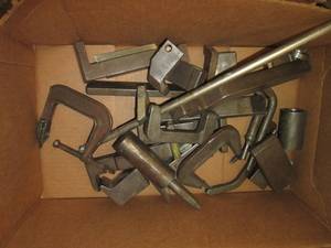 lot 125 image: Lot of clamps and metal dies...