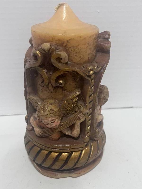 lot 23 image: Vintage Handcrafted and Hand Painted Candle with Cherubs 6 11