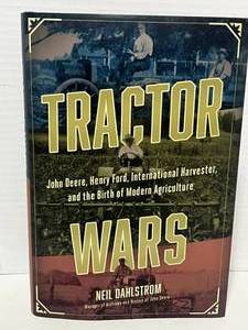 lot 24 image: 2022 Tractor Wars Book w Dust Jacket by Neil Dahlstrom JD, Ford, IH and the birth of Modern Agriculture