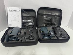 lot 32 image: 2 New Black Falcon Collapsible Quadrocopter Drones