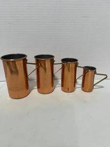 lot 49 image: Vintage Set of 4 Copper Measuring Cups w Brass Handles