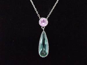 lot 15 image: .925 Sterling Silver Pink Sapphire and Aquamarine Crystal Dangle Pendant Necklace