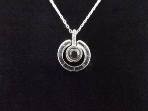 lot 26 image: .925 Sterling Silver 100 Language I LOVE YOU Pendant Necklace