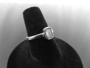 lot 55 image: .925 Sterling Silver Topaz Ring Size 7