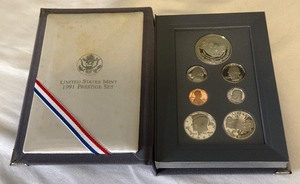 lot 33 image: 1991 Prestige Mount Rushmore Anniversary - 7 Coin Set