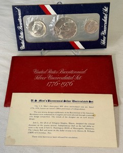 lot 92 image: 1976 Bicentennial 1776-1976 40% SILVER Uncirculated 3 Coin Set - original package with coa - red packet shows fire damage around edge