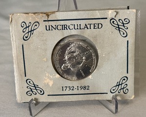 lot 93 image: 1982 S-George Washington Half Dollar 250th Anniversary Coin Uncirculated - coin in cello shrink wrap with cardboard case